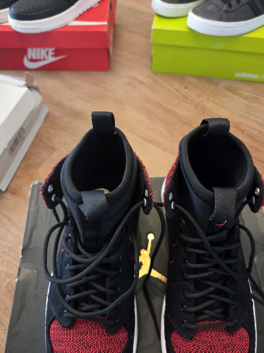 Jordan Men’s Black and Red High-Top Knit & Suede Sneakers